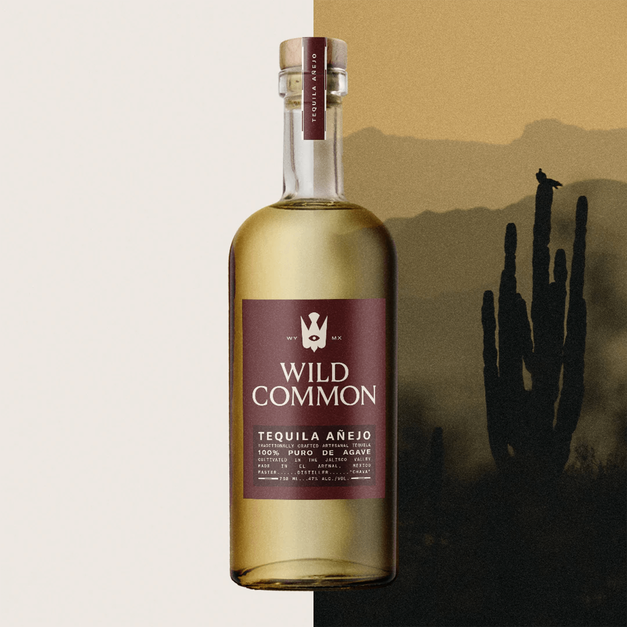 Bottle of Wild Common Añejo Tequila showcasing its golden color and elegant label.