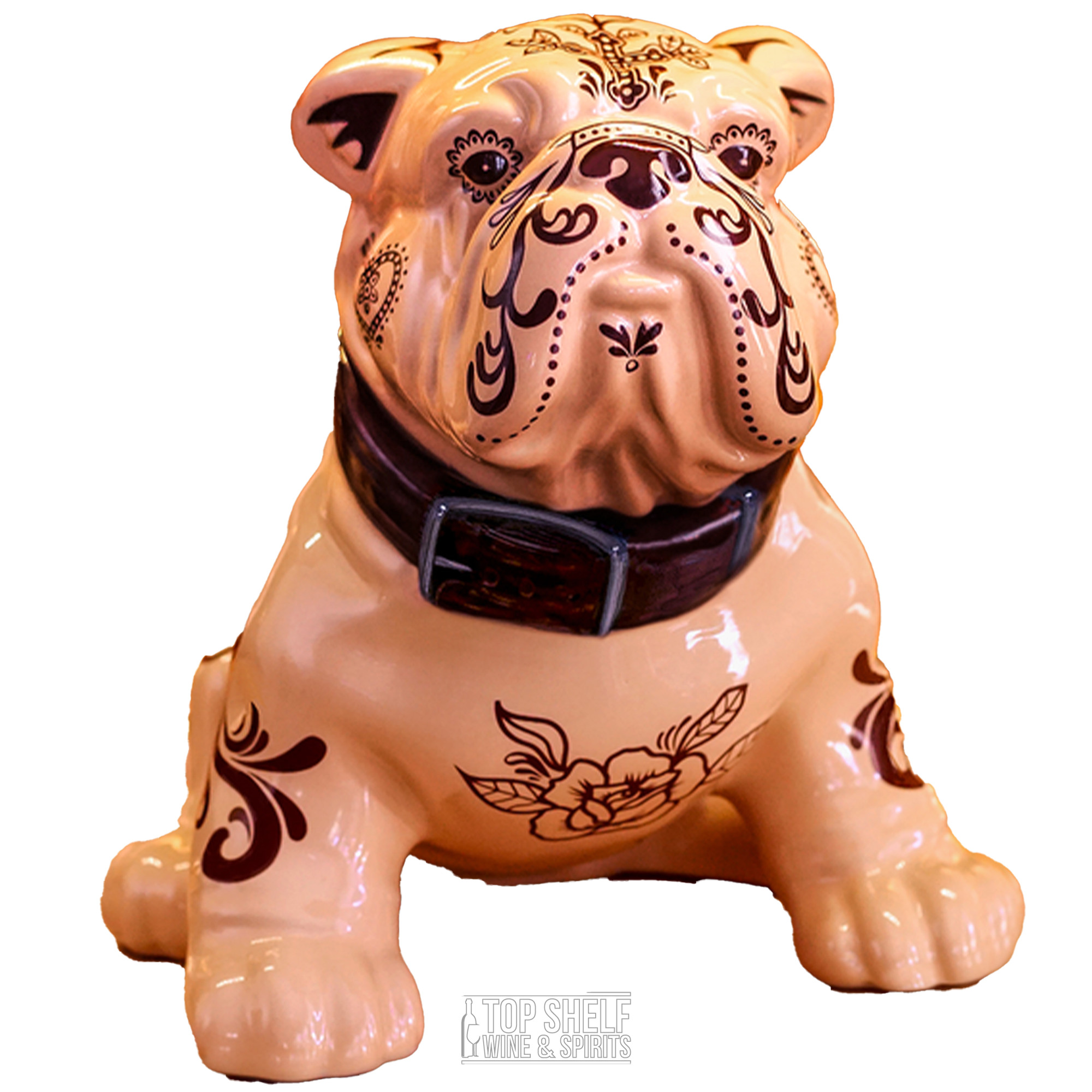 Ceramic bulldog figurine with floral designs, representing Mascota Añejo Bulldog Tequila.