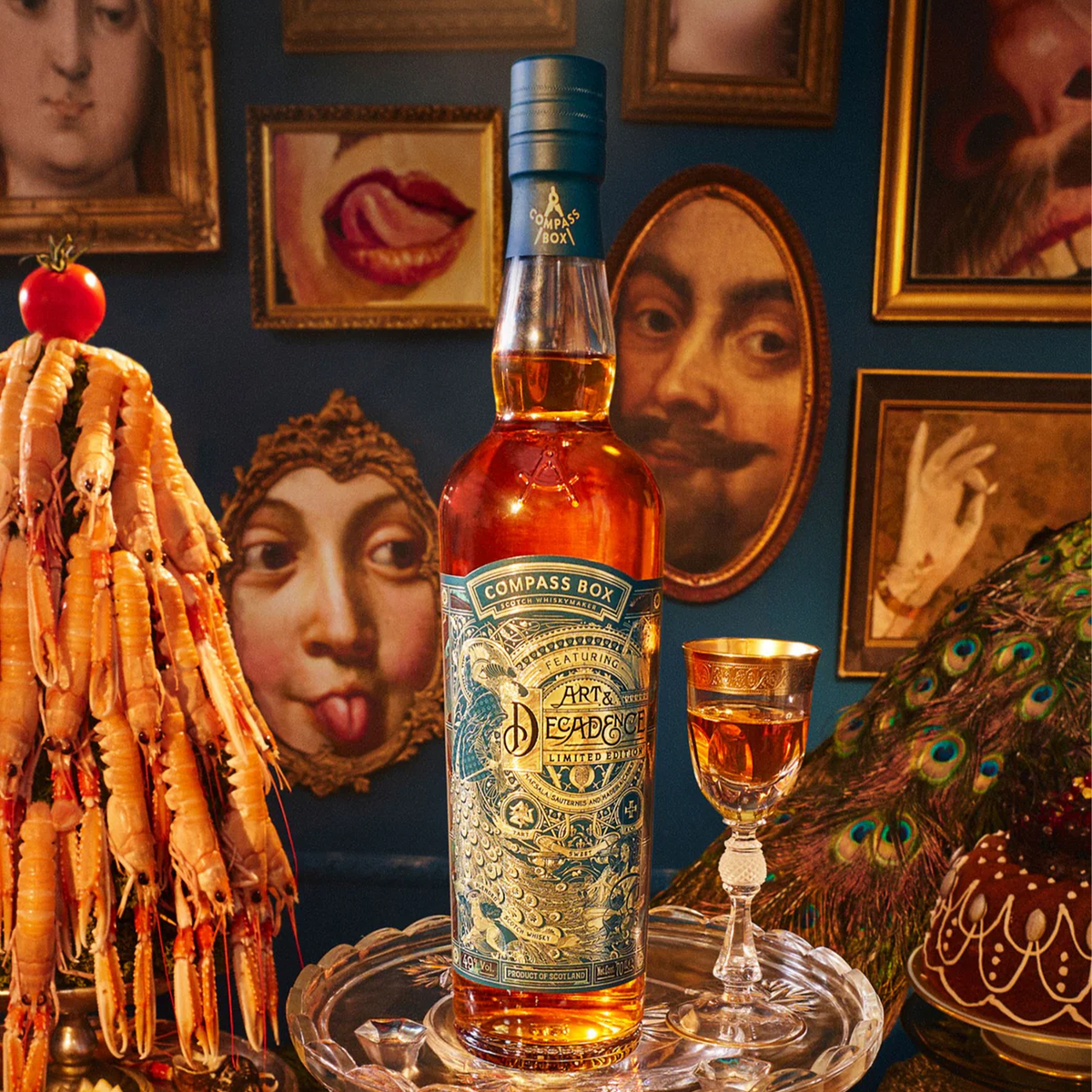Compass Box Art & Decadence 2023 Scotch whiskey bottle displayed in an artful setting with intricate decor.