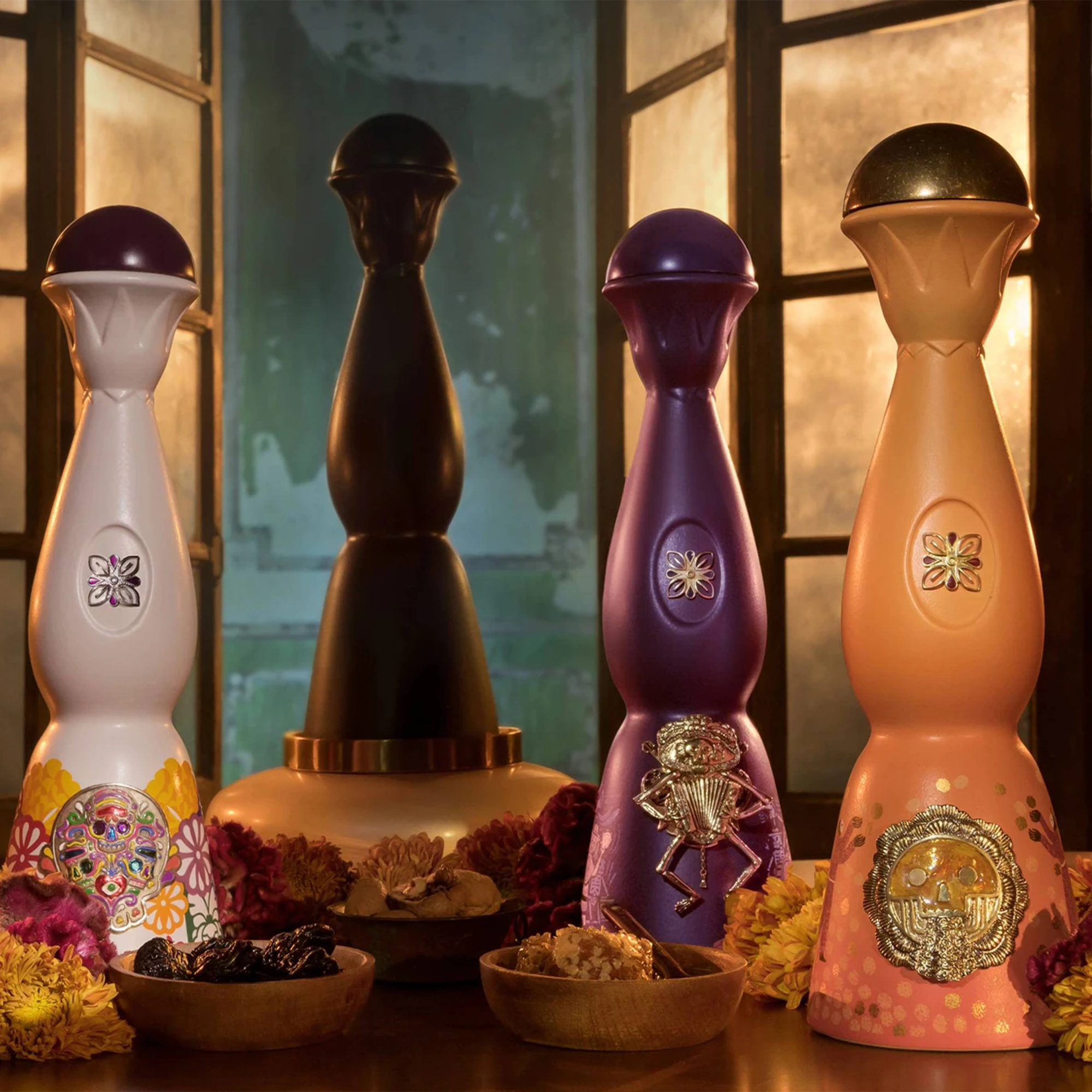 Clase Azul Día de Muertos Limited Edition tequila bottles featured with festive decorations and traditional elements.