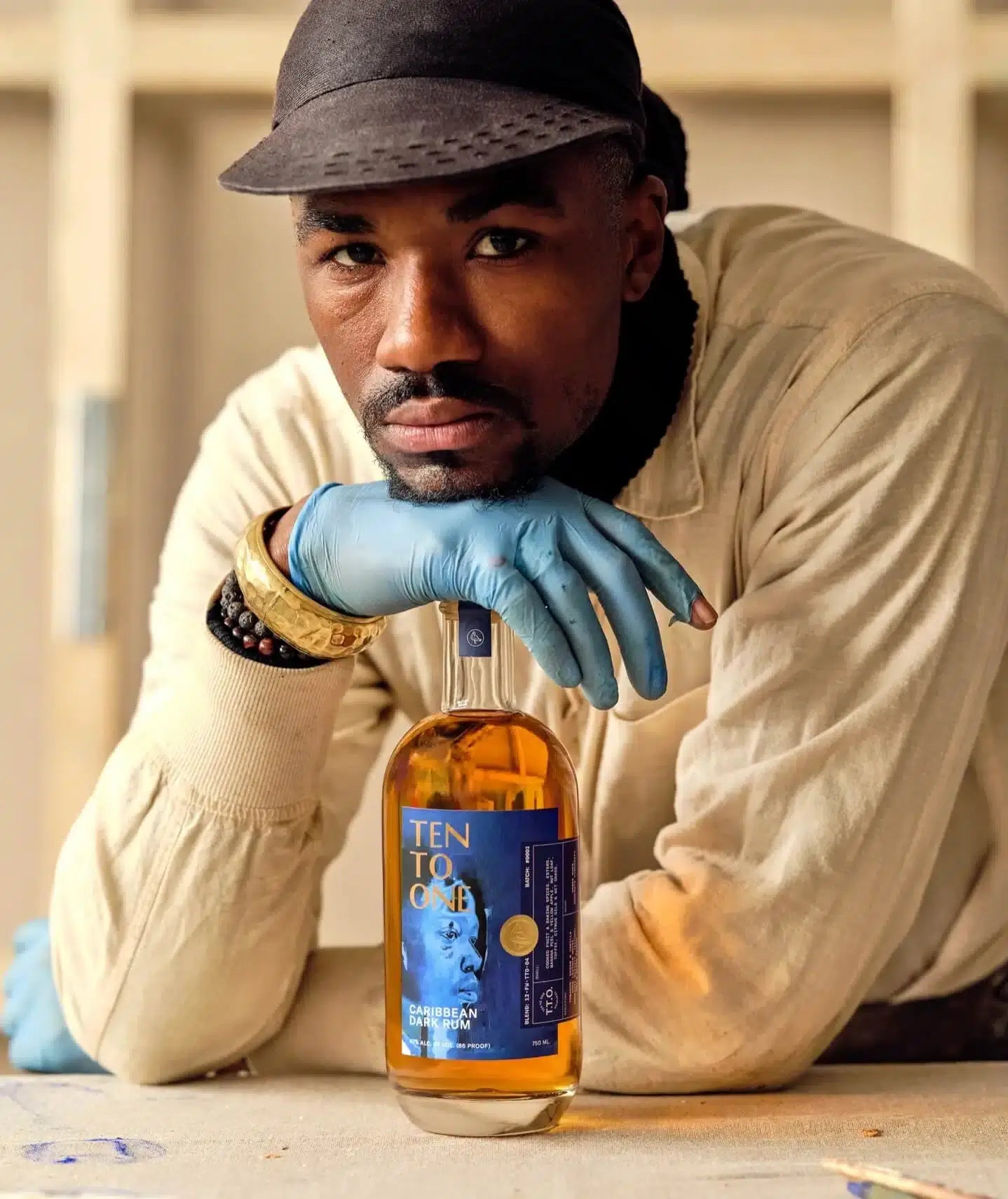 Ten To One Caribbean Dark Rum bottle by Devin B. Johnson, showcasing arts and culture for Black History Month edition.