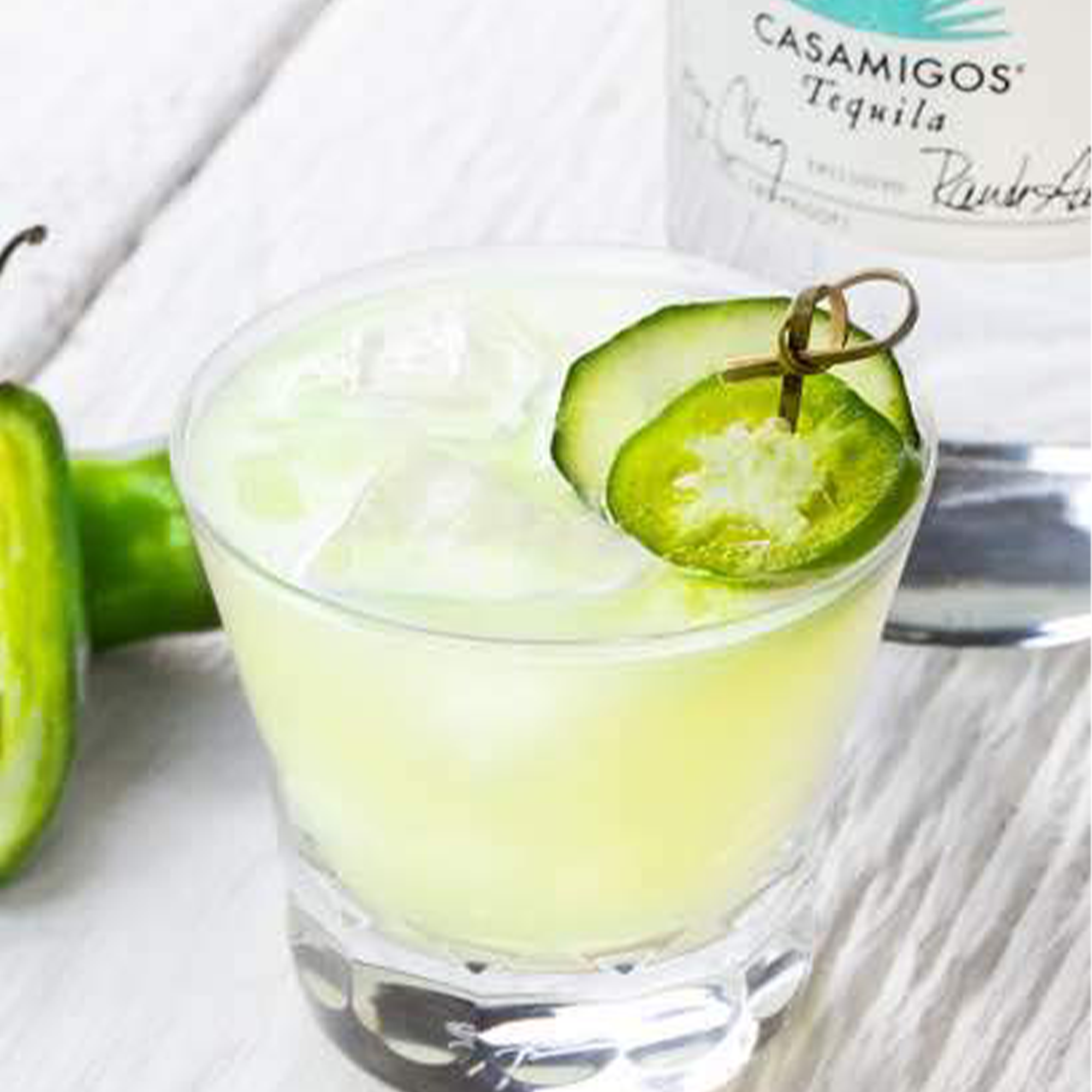 Refreshing cocktail with Casamigos Jalapeño Blanco Tequila garnished with jalapeño slices.
