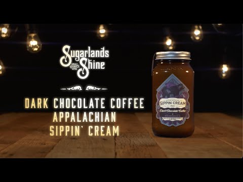 Sugarlands Shine Dark Chocolate Coffee Sippin' Cream in decorative mason jar with rich cacao scent.