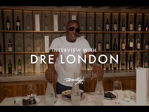 Dre London during an interview showcasing Don Londrés Blanco Tequila in an elegant setting.