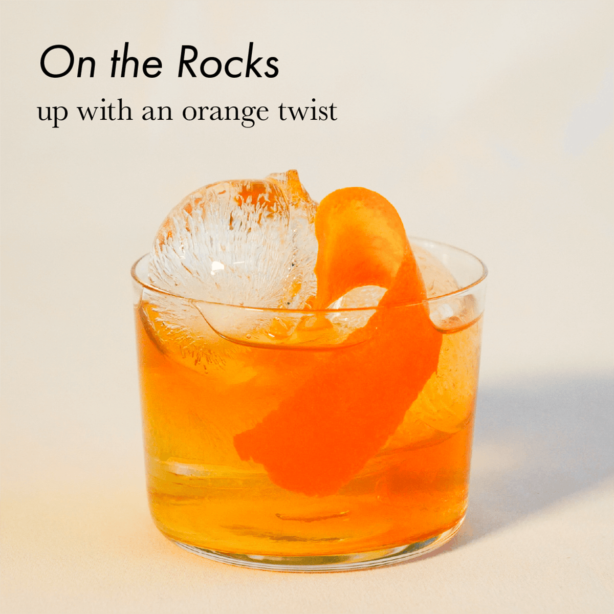 On the Rocks cocktail featuring an orange twist and ice in a glass, highlighting refreshing drink options.