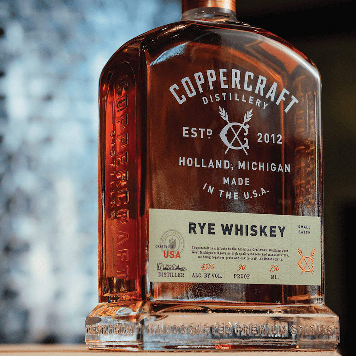 Coppercraft Straight Rye Whiskey bottle from Holland, Michigan, showcasing premium quality and distinctive flavor profile.