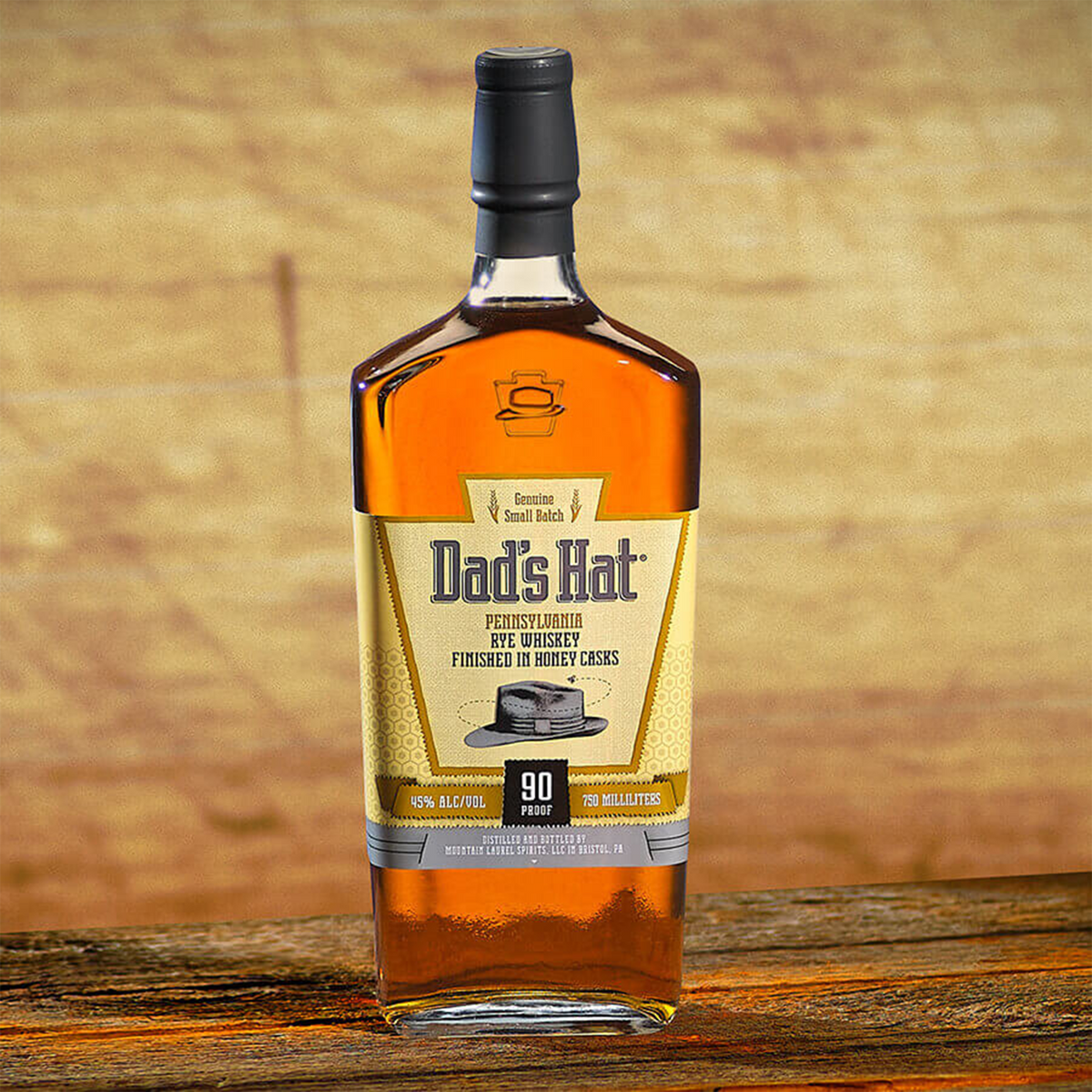 Dad's Hat Honey Cask Finish Rye Whiskey bottle showcasing its 90 proof and honey cask aging process.