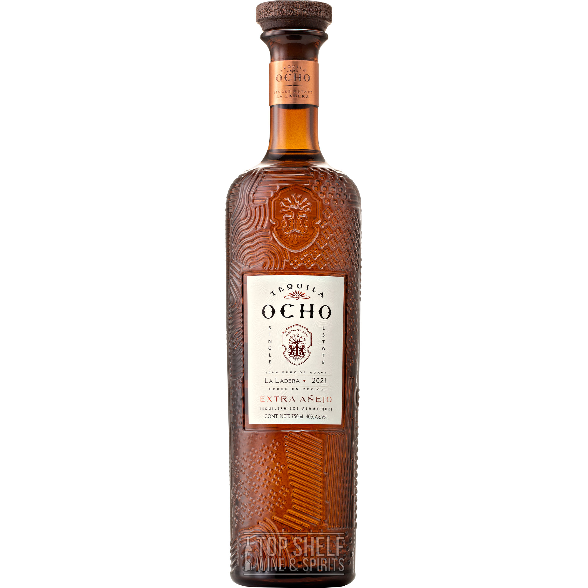 Tequila Ocho La Ladera Extra Añejo 2021 in an elegant bottle with fine detailing and rich amber color.