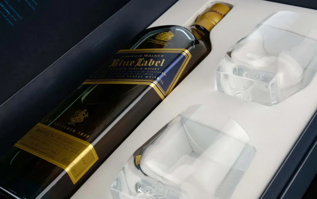Johnnie Walker Blue Label Gift Set featuring a bottle and two exquisite whiskey glasses in a premium box.