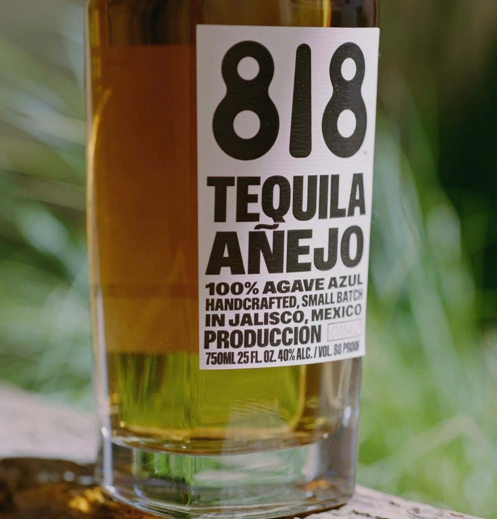818 Añejo Tequila bottle showcasing handcrafted details with 100% agave azul from Jalisco, Mexico.