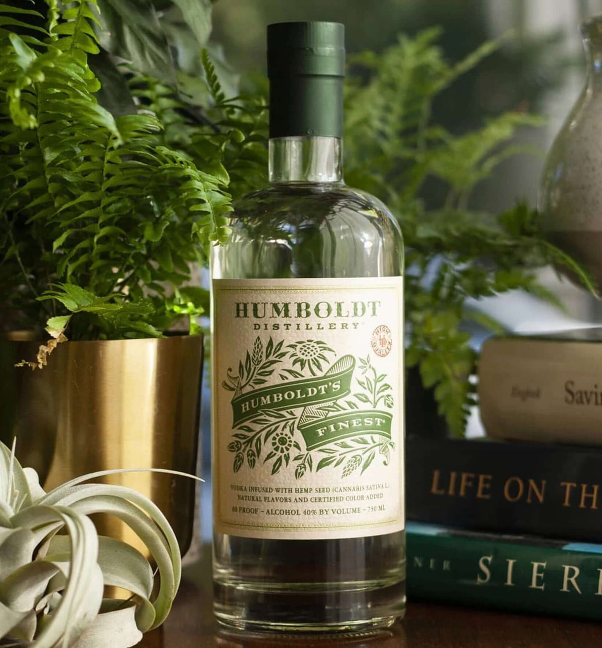 Bottle of Humboldt's Finest hemp-infused vodka, showcasing its botanical design and herbaceous flavor notes.
