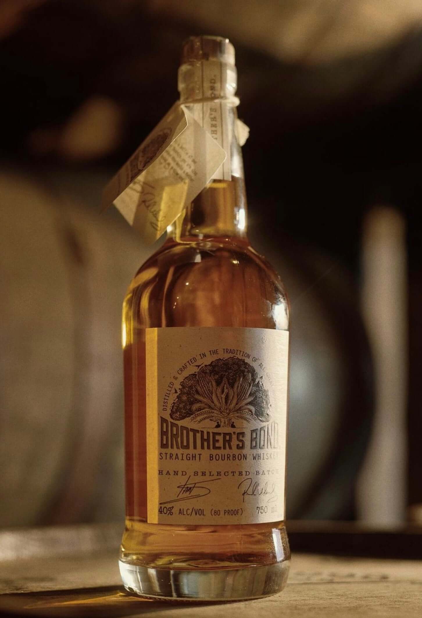Bottle of Brother's Bond Straight Bourbon, crafted by Ian Somerhalder and Paul Wesley, showcasing rich amber color.