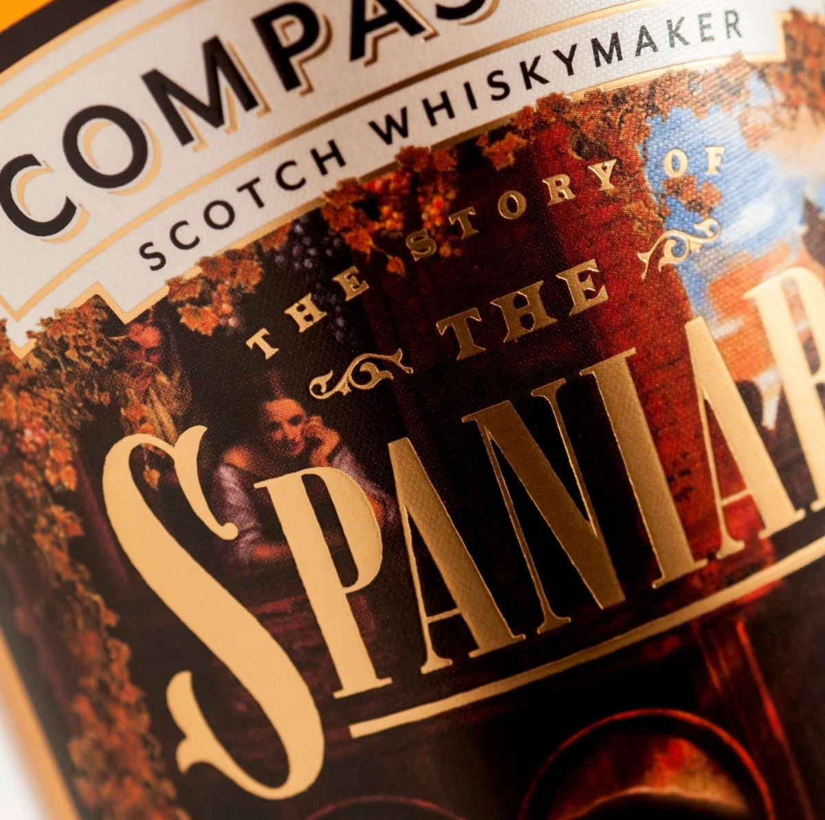 Close-up of Compass Box The Story of the Spaniard Scotch bottle label with rich detailing.