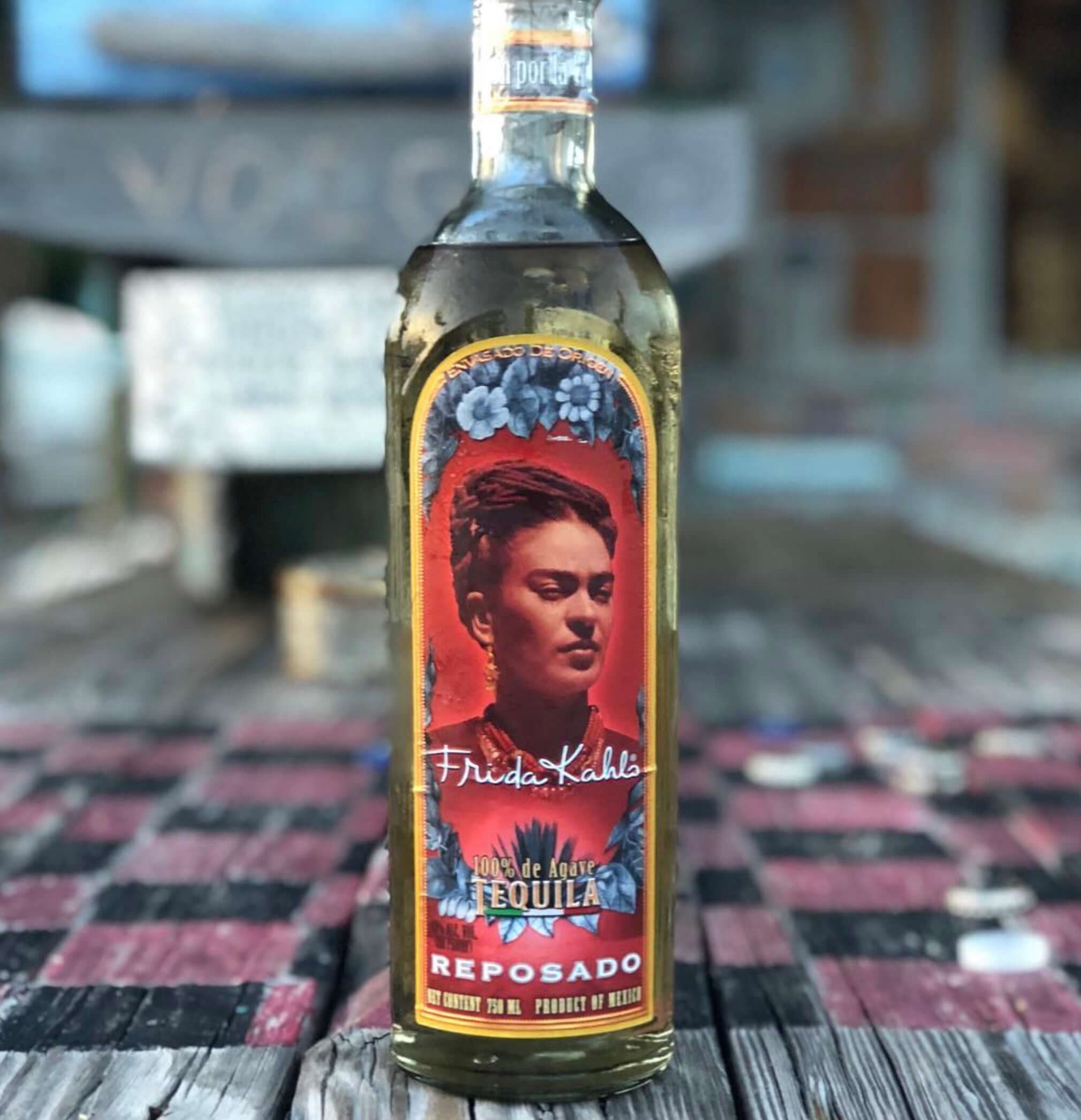 Frida Kahlo Reposado Tequila bottle with vibrant label, showcasing smooth, premium tequila aged in oak casks.