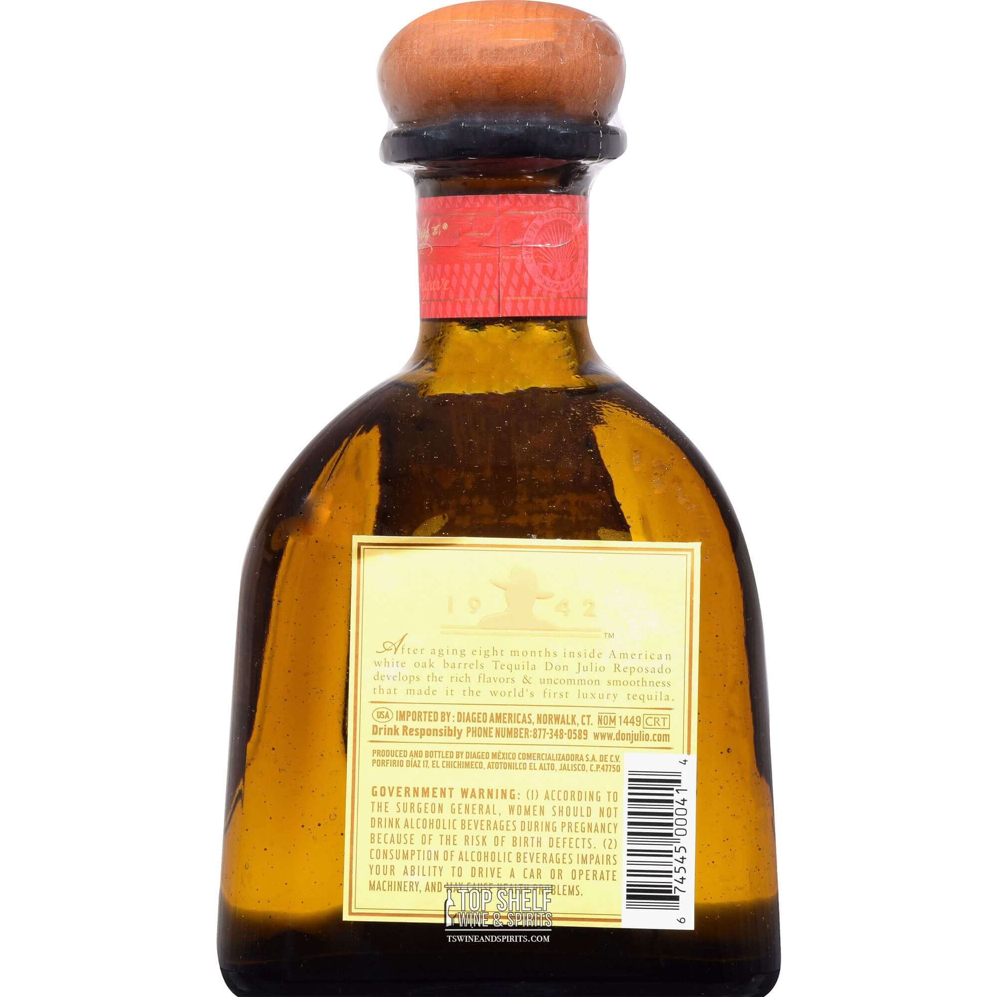 Back view of Don Julio Reposado Tequila bottle showcasing label and cork, highlighting its rich amber color and craftsmanship.