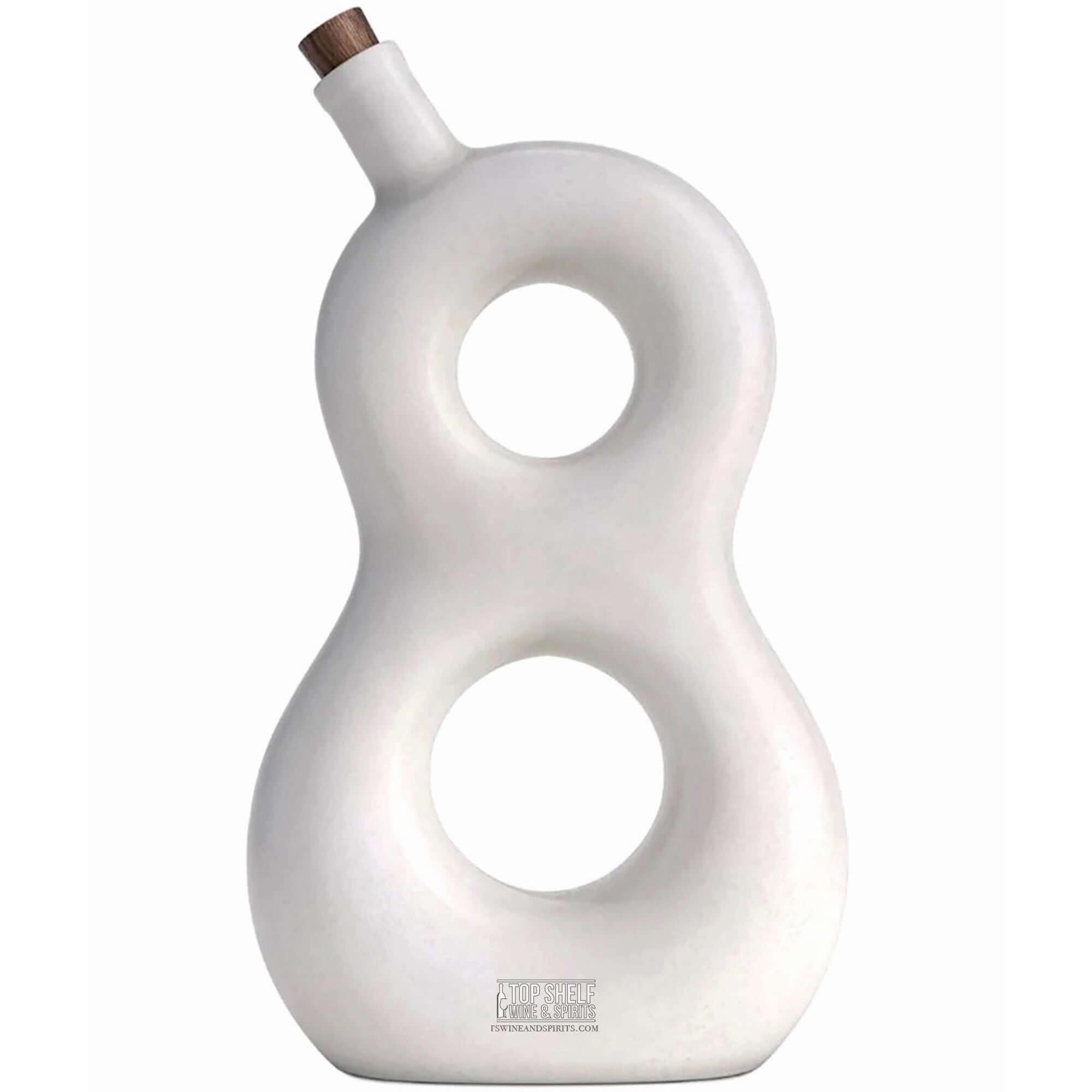Artistic white bottle in the shape of the number 8, designed for Eight Reserve Añejo Tequila.