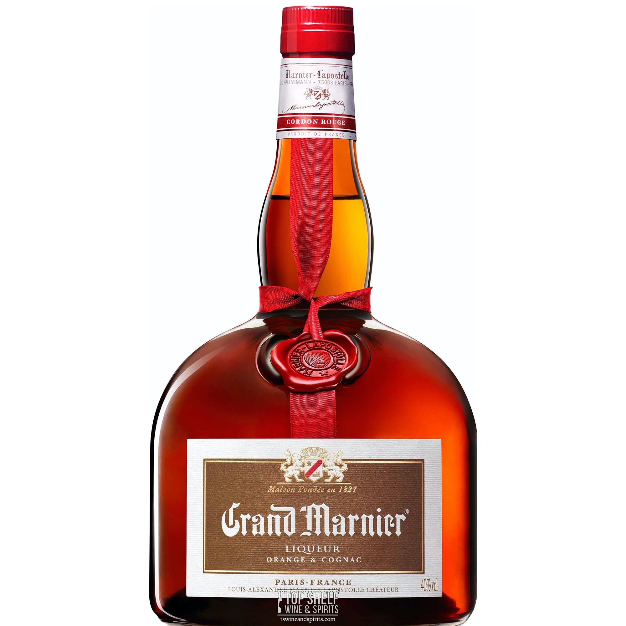 Bottle of Grand Marnier Orange & Cognac Cordon Rouge, showcasing its amber color and elegant packaging.