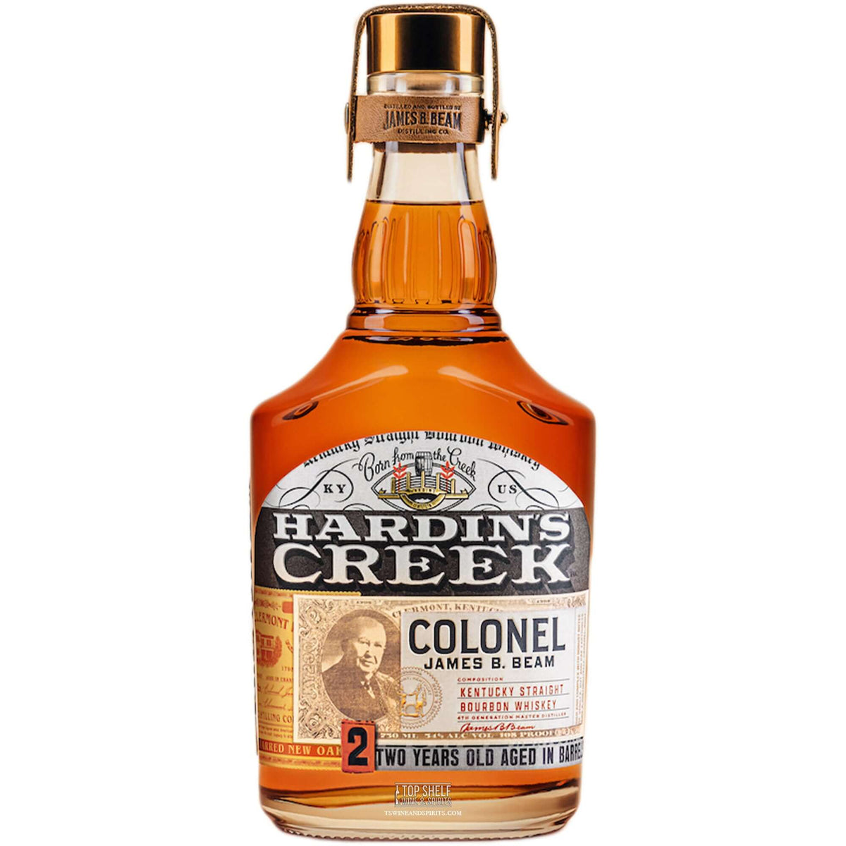 Hardin's Creek Colonel James B. Beam 2 Year Bourbon bottle showcasing premium whiskey aged in barrels.