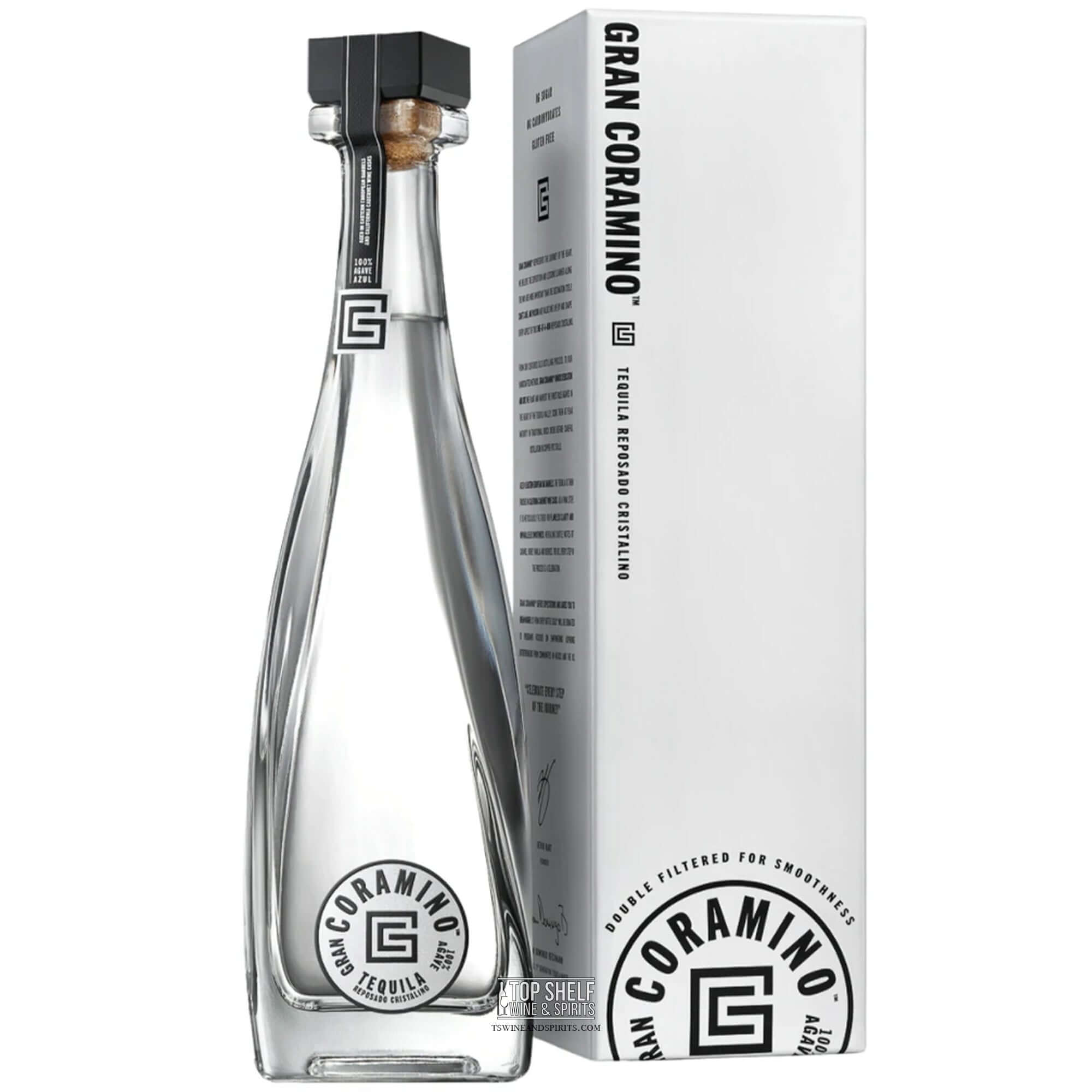 Gran Coramino Cristalino Tequila bottle beside its elegant packaging, showcasing quality and craftsmanship.