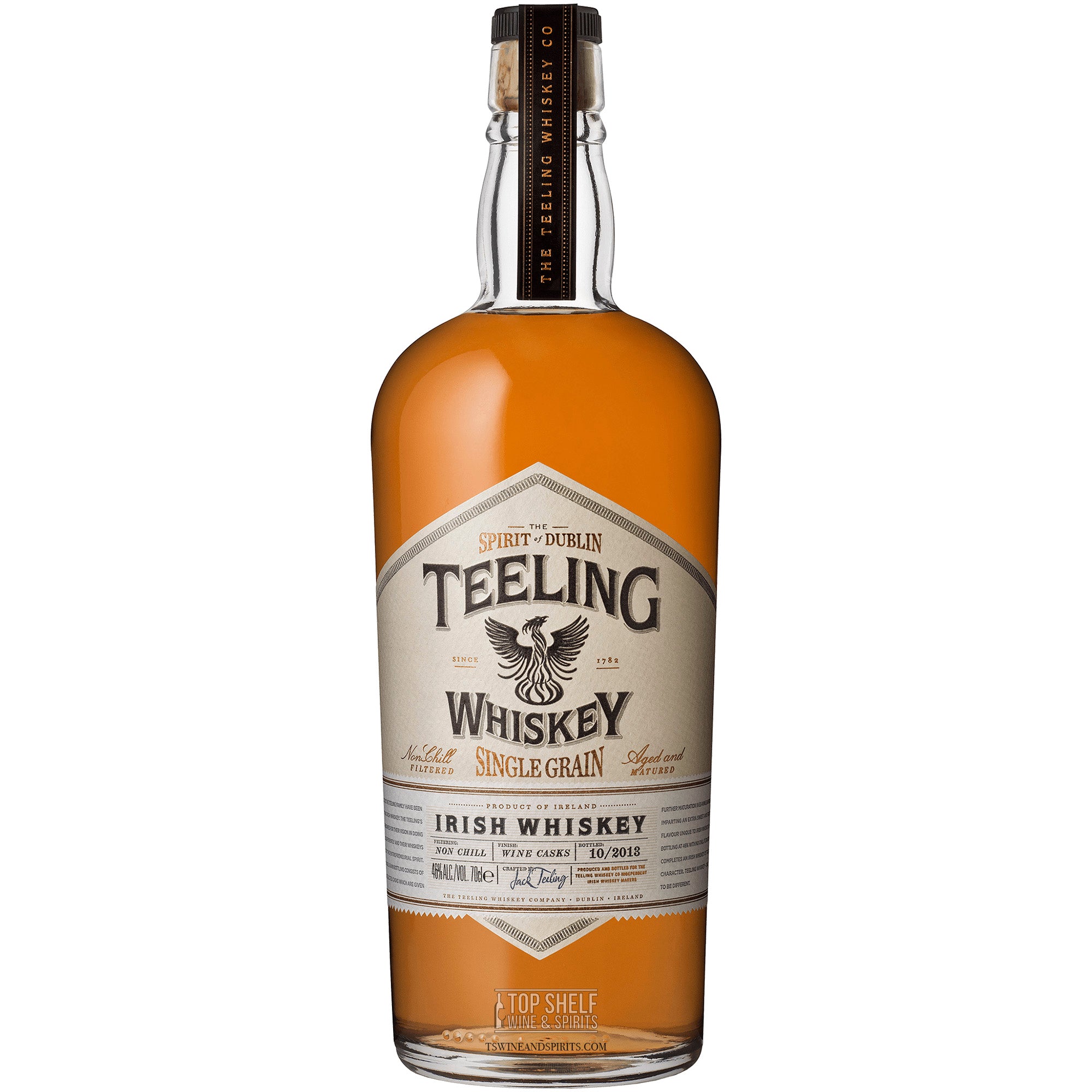 Teeling Single Grain Irish Whiskey bottle featuring unique label and amber color, aged in French oak wine casks.