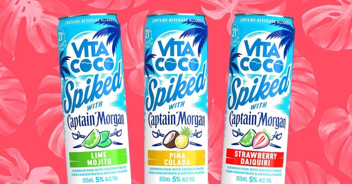 Vita Coco Spiked with Captain Morgan cocktail cans featuring Lime Mojito, Piña Colada, and Strawberry Daiquiri on a tropical background.