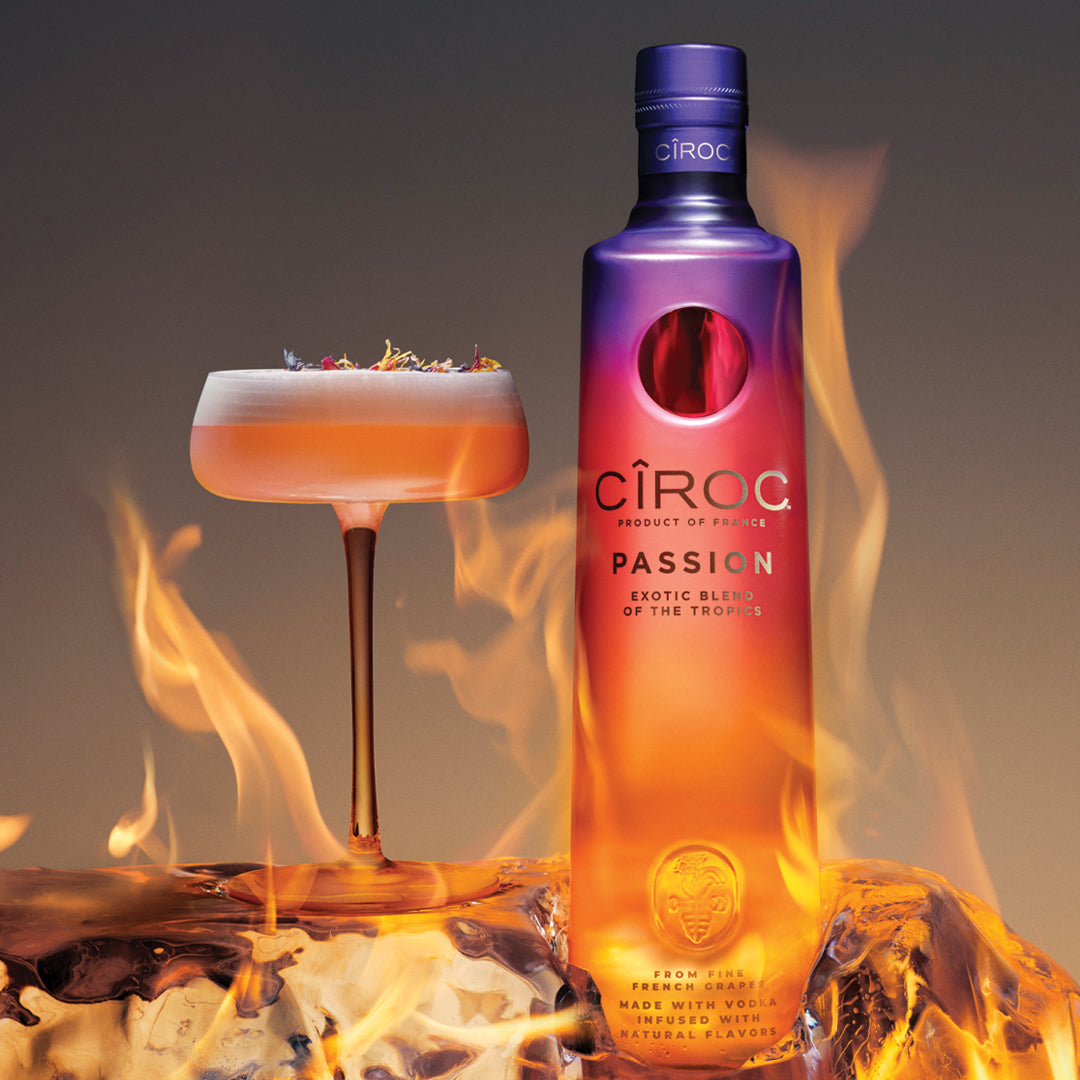 Ciroc Passion Vodka Limited Edition bottle with cocktail, featuring tropical flavors of pineapple and passion fruit.