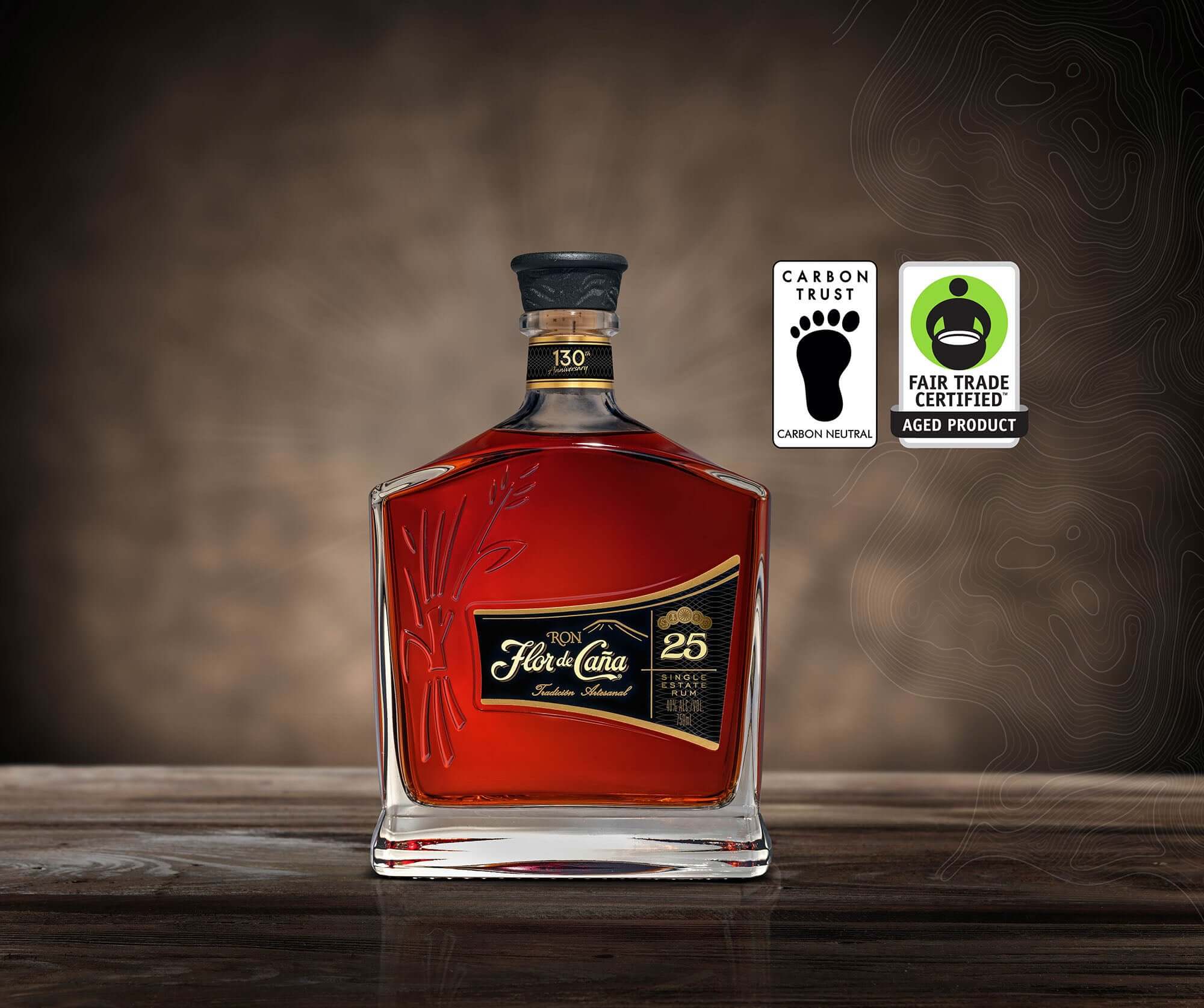 Ron Flor de Caña 25 Year Rum bottle with Carbon Trust and Fair Trade certified logos.