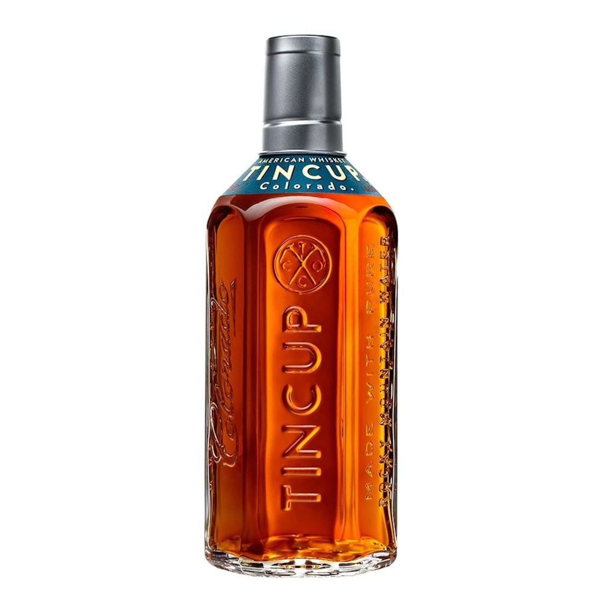 TINCUP American Whiskey bottle, inspired by Colorado mining history and crafted with a blend of high rye bourbon.