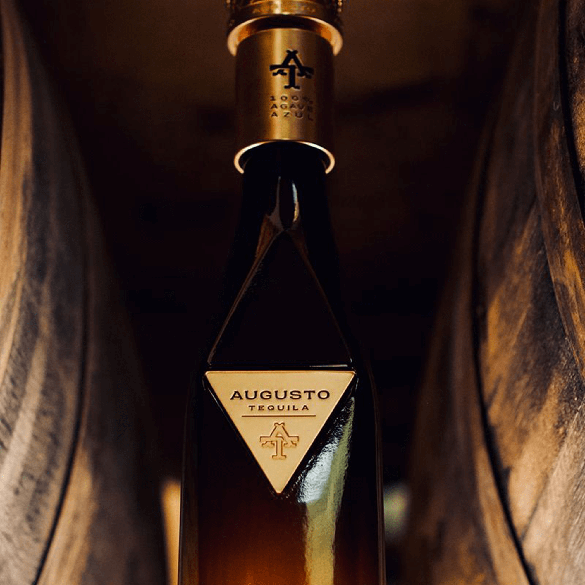 Augusto Sherry Cask Reposado Tequila bottle aged in organic casks, showcasing its unique design and premium quality.