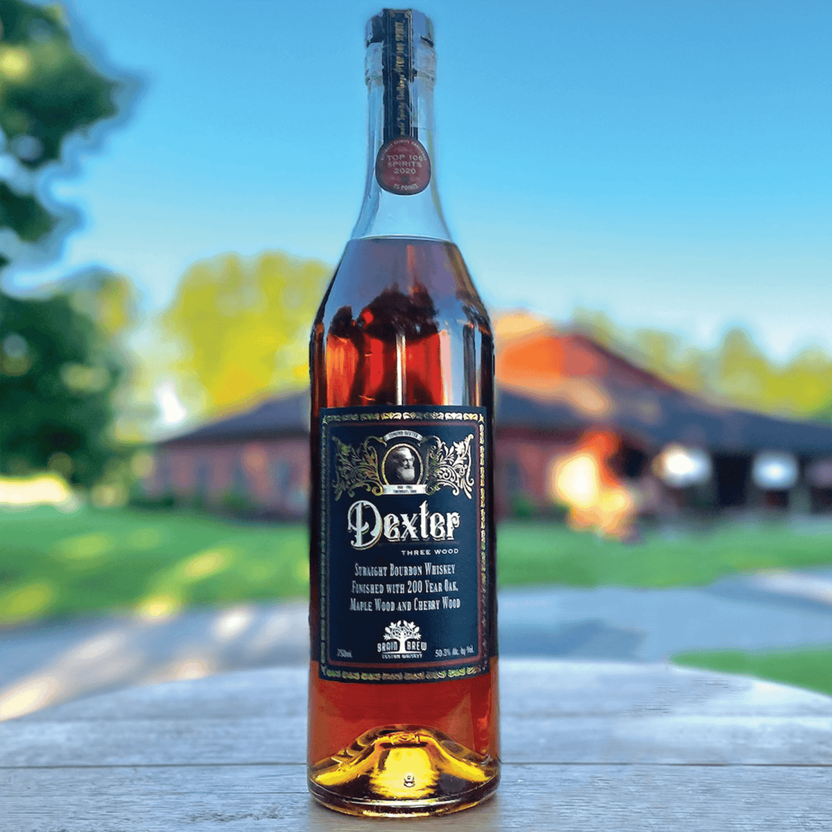 Dexter Three Wood Straight Bourbon Whiskey bottle, showcasing its rich color and elegant label.