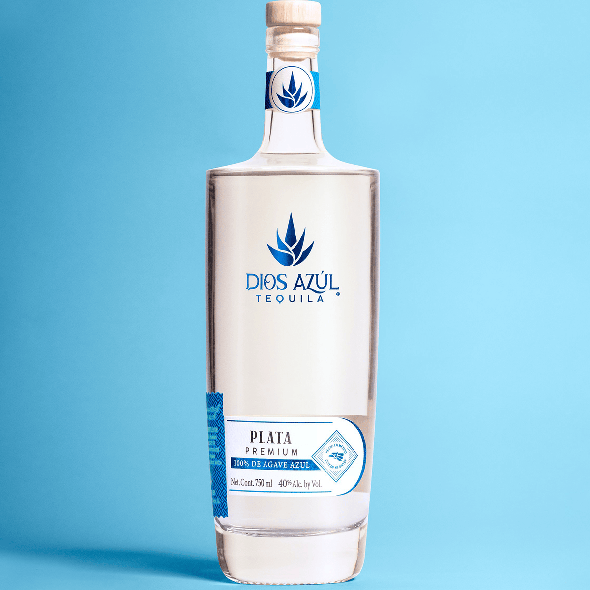 Dios Azul Plata Premium Tequila bottle showcasing its crisp, fresh profile against a blue background.