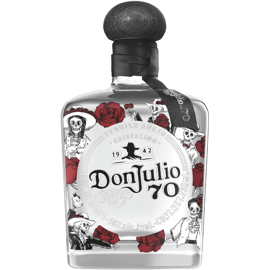 Don Julio 70 Dia De Los Muertos limited edition tequila bottle with decorative skulls and roses.