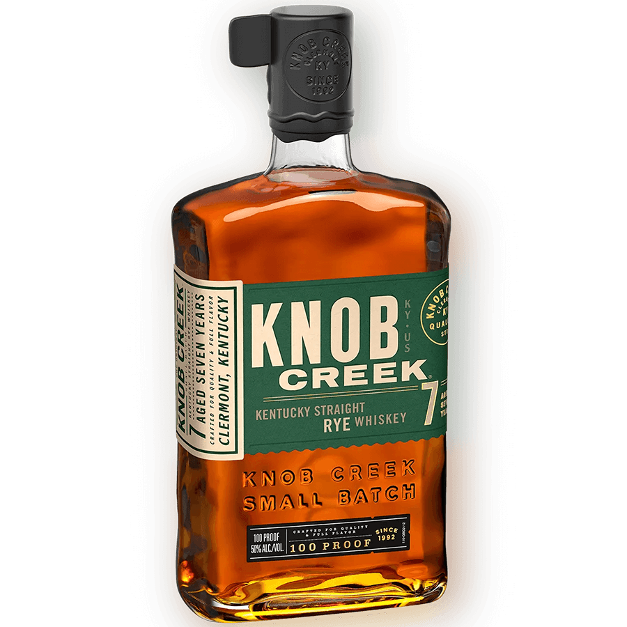 Knob Creek 7 Year Rye Whiskey bottle showcasing rich amber color and full flavor profile, bottled at 100 proof.