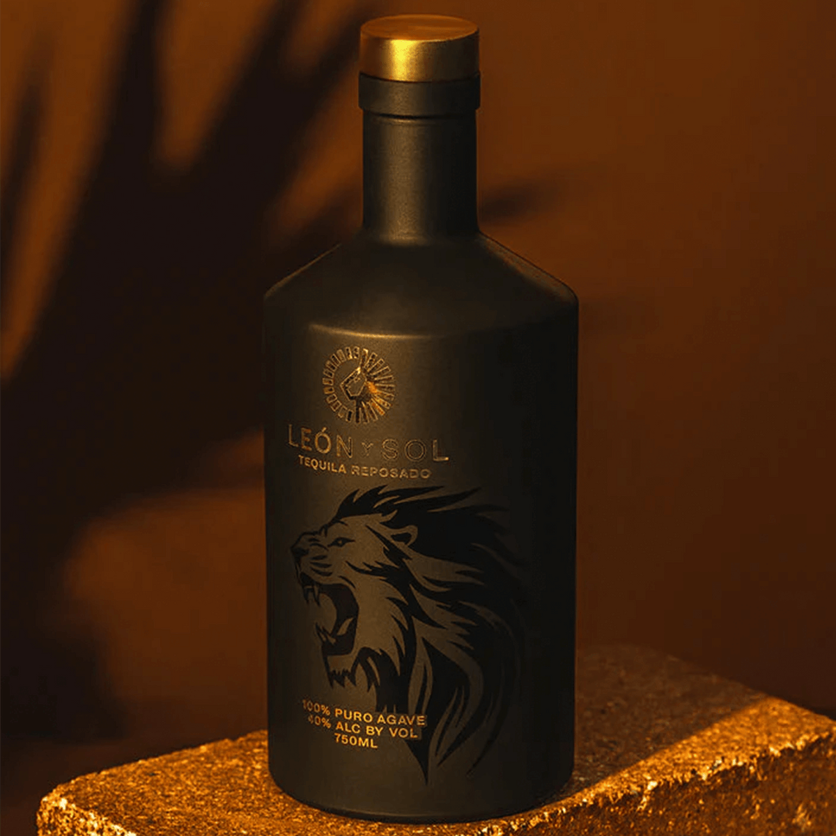 León y Sol Reposado Tequila bottle, 750ml, 100% blue agave, bold black design with lion emblem.
