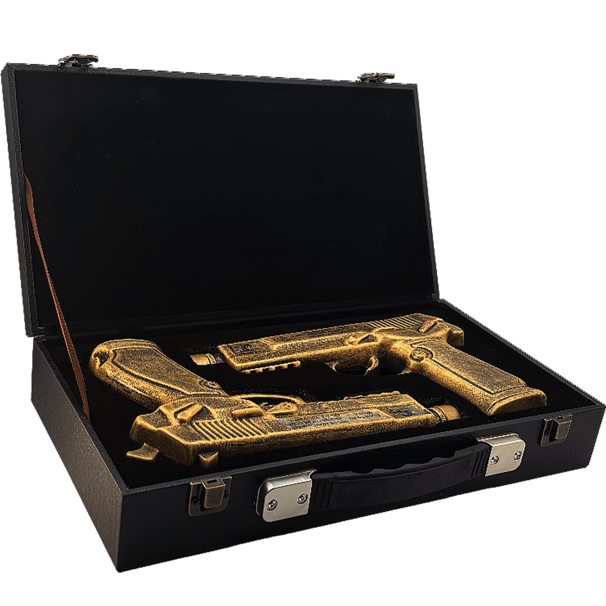 Gold gun sculpture set in a black display case, featuring two intricately designed pistols.