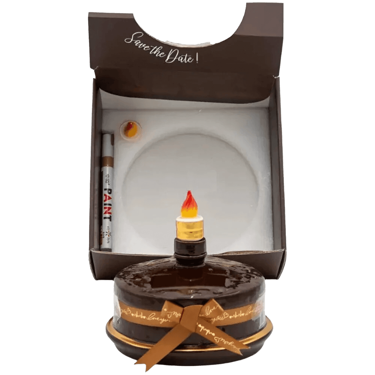 Oceano Azul Round Chocolate La Cake Vodka in a cake-shaped bottle inside a decorative box, with a pen for writing messages.