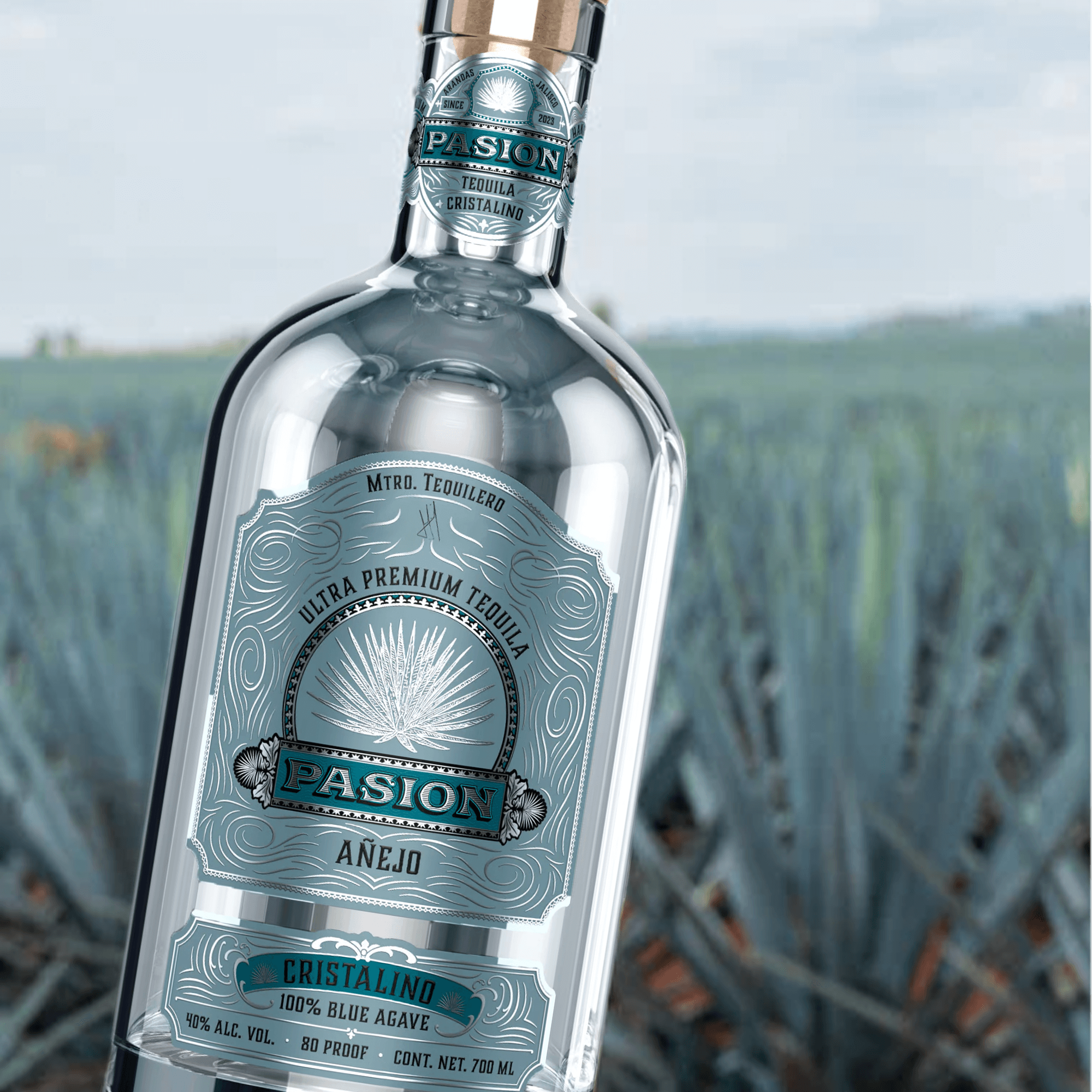 Pasión Añejo Cristalino Tequila 700ml with agave fields in the background, showcasing its crystalline purity and premium quality.