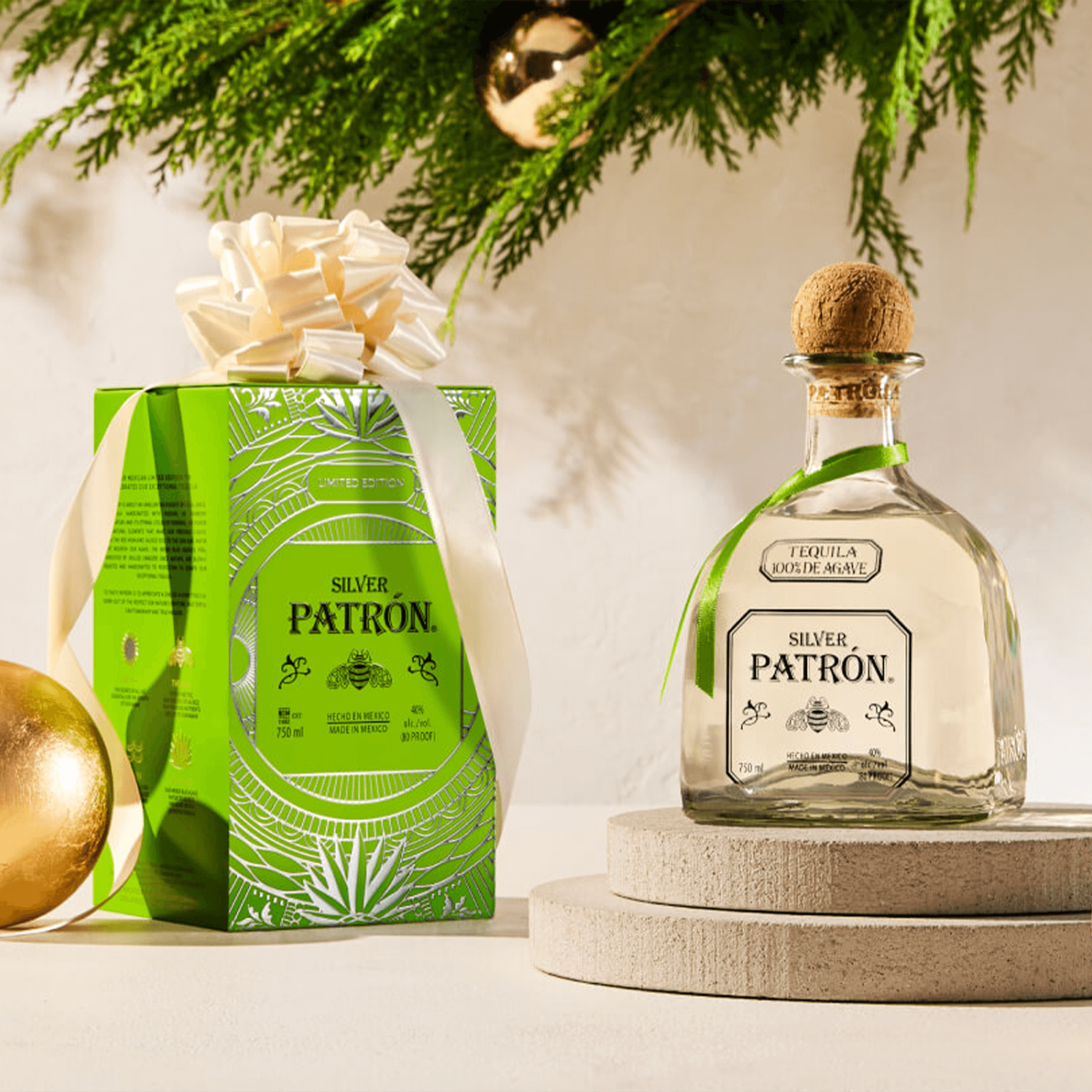 Patrón Silver Tequila in a decorative tin gift box, featuring a smooth spirit ideal for cocktails.