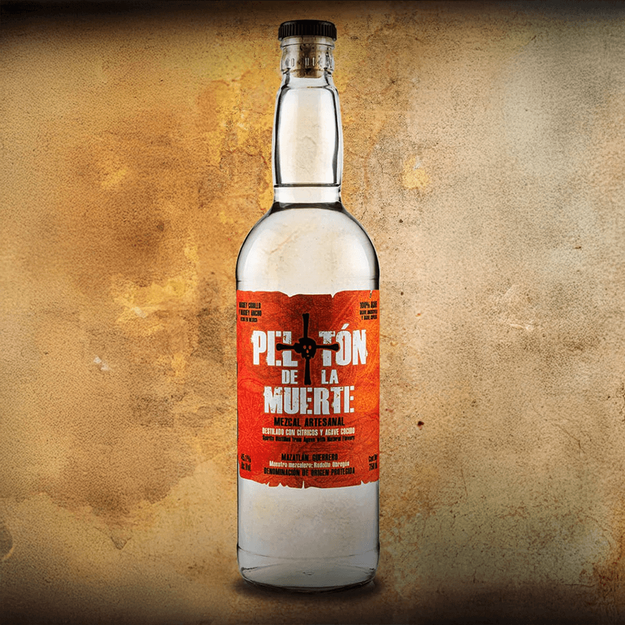 Bottle of Peloton de la Muerte Pechuga Mezcal with bold label design on rustic background.
