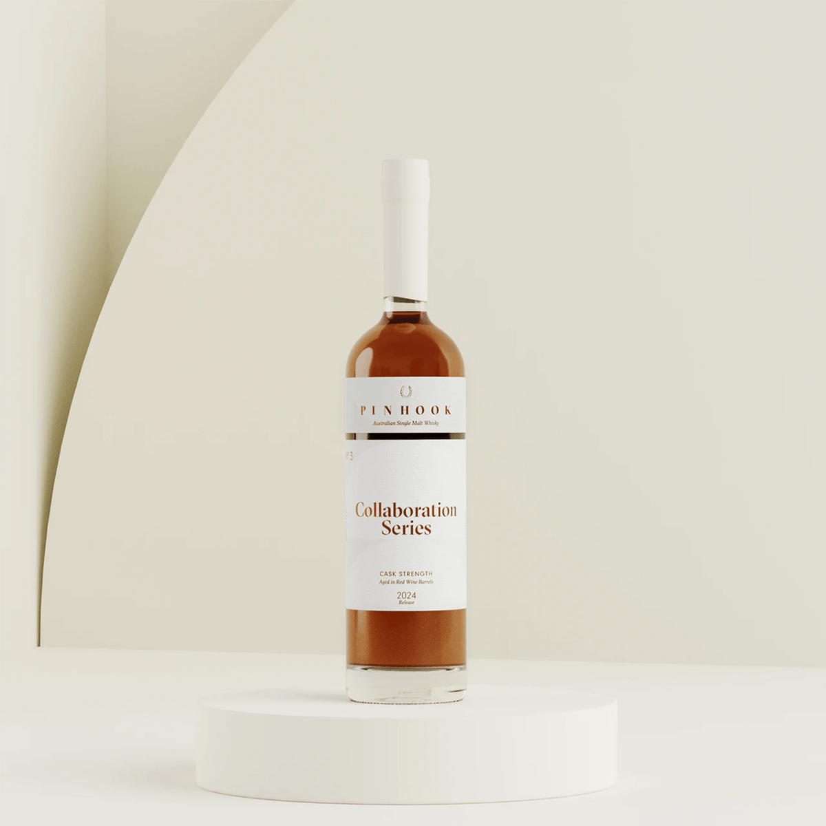 Pinhook 2024 Collaboration Series No. 3 Cask Strength Whisky on display, showcasing its unique design and rich amber color.