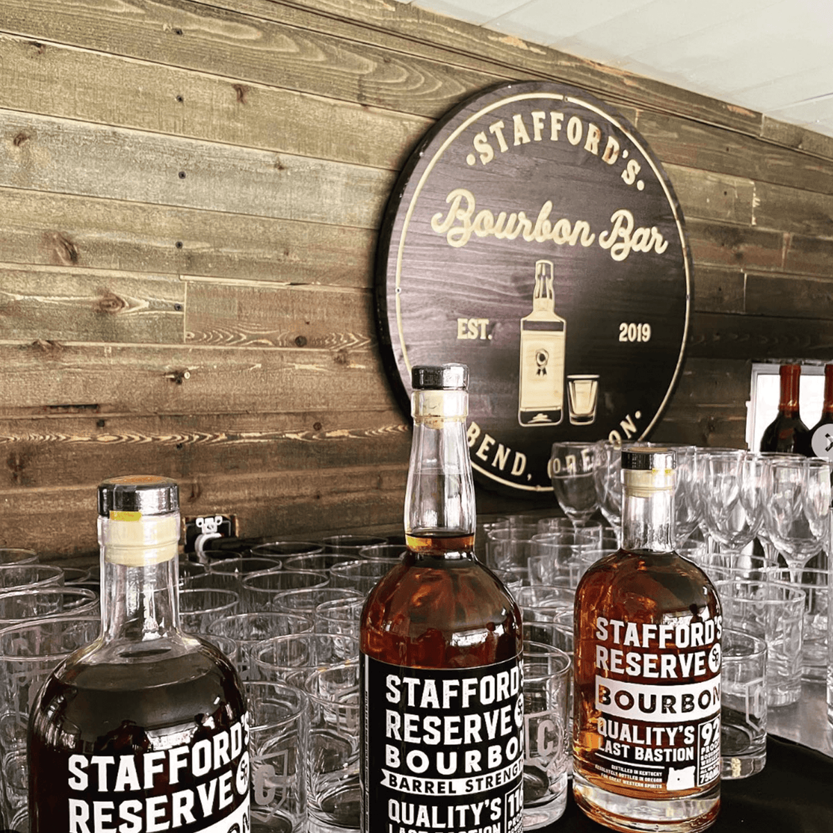 Stafford's Reserve Barrel Strength Bourbon displayed at Stafford's Bourbon Bar, showcasing quality whiskey in a rustic setting.