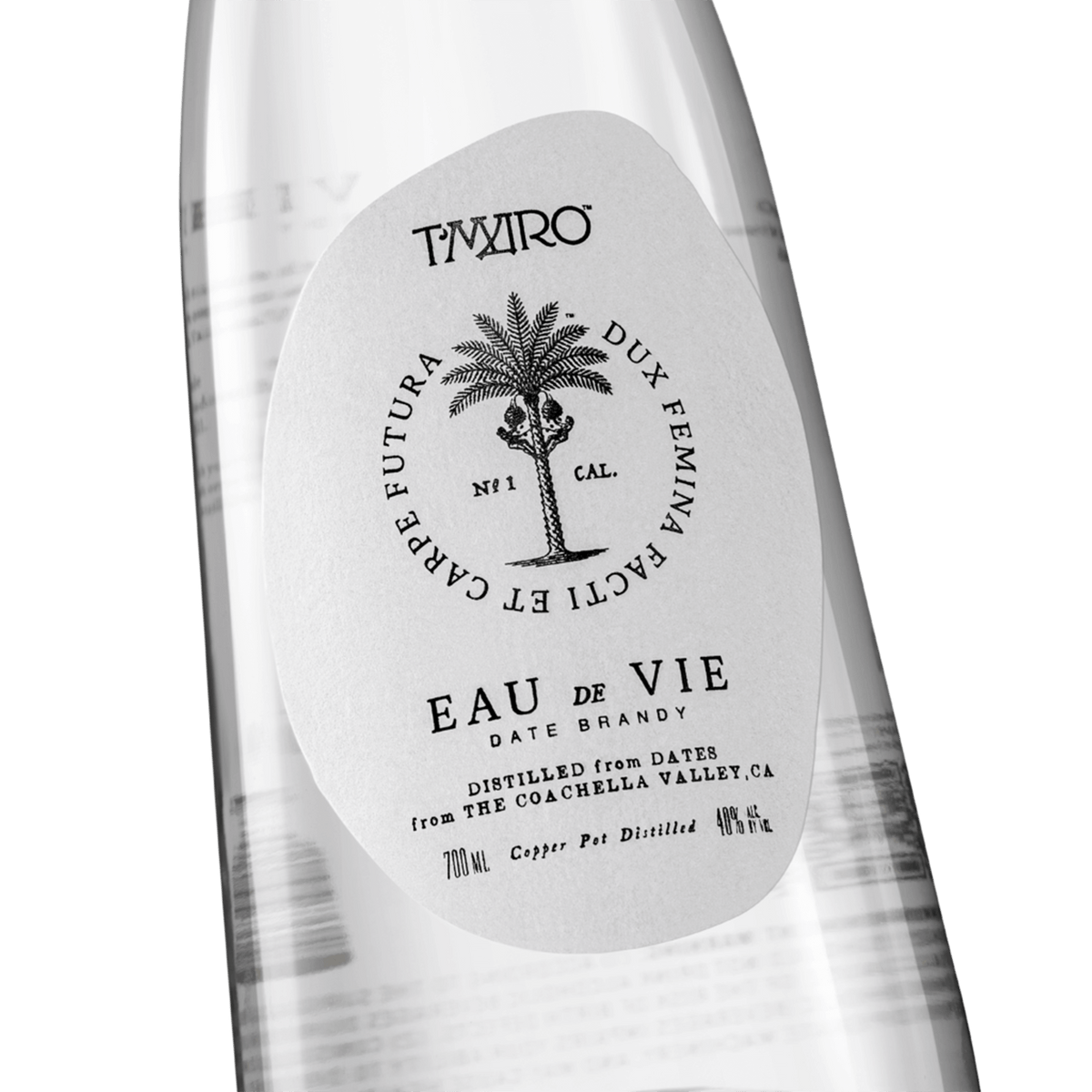 T'maro Eau de Vie 700ml bottle, ultra-premium date brandy distilled from organic dates in Coachella Valley.