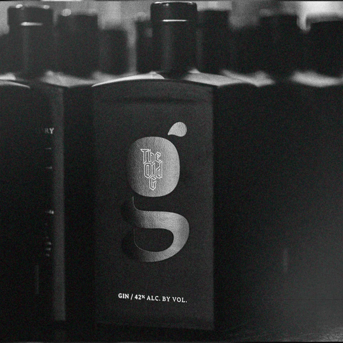 The Old G Gin bottle, premium gin crafted with a blend of botanicals, 42% alcohol by volume.