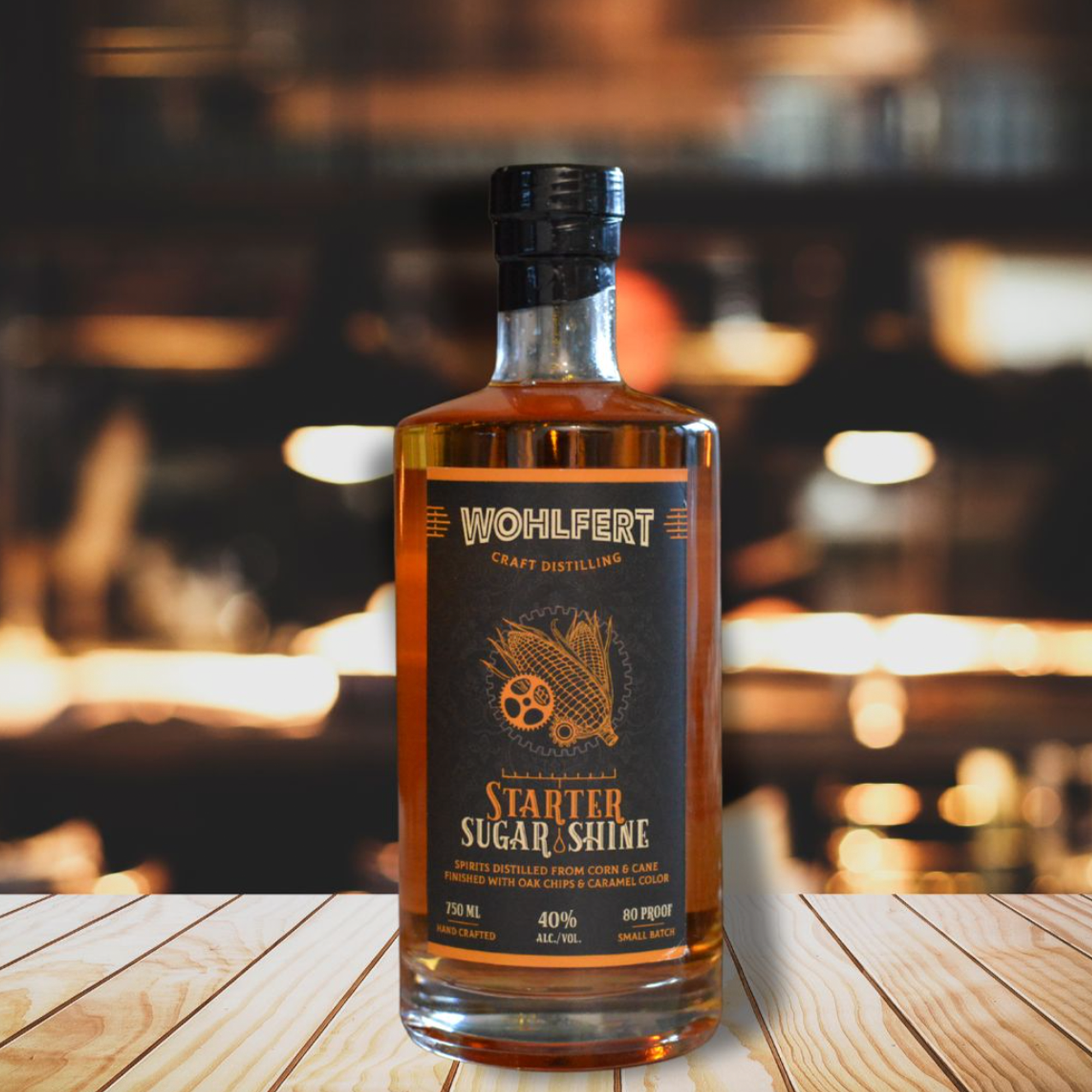 Bottle of Wohlfert Starter Sugar Shine, an 80 proof moonshine with a smooth, distinct flavor, ideal for baked goods.