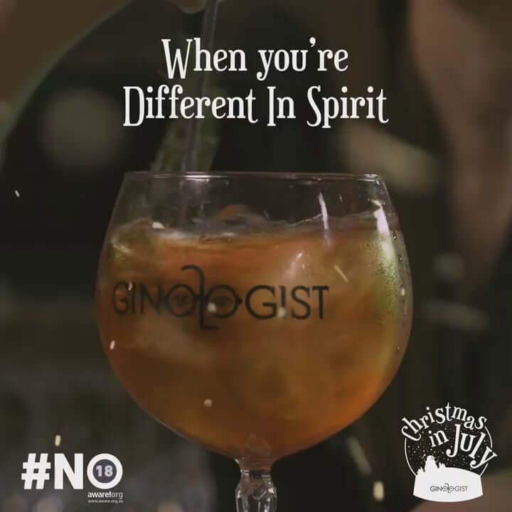 A cocktail with Ginologist branding, evoking festive spirits during Christmas in July.